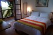  cama queen do chalé Girassol.