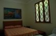 Suite ARCOS. A maior da casa, tendo uma cama casal e uma solteira. Banheiro bem grande e equipado co