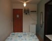 Suíte casal com cama de casal, ar-condicionado, frigo-bar, tv, ar condicionado, internet wi-fi e wc privativo :: Pousada Recanto Bertioga Suíte casal com cama de casal, ar-condicionado, frigo-bar, tv, ar condicionado, internet wi-fi e wc privativo :: Pousada Recanto Bertioga