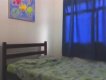 Suíte casal com cama de casal, ar-condicionado, frigo-bar, tv, ventilador de teto e wc privativo :: Pousada Recanto Bertioga Suíte casal com cama de casal, ar-condicionado, frigo-bar, tv, ventilador de teto e wc privativo :: Pousada Recanto Bertioga