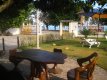 Área verde com mesa rústica abaixo da mangueira. Em frente ao praia. :: Pousada Tropicália - Foto 2 Área verde com mesa rústica abaixo da mangueira. Em frente ao praia. :: Pousada Tropicália - Foto 2