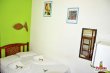 Quarto quadruplo (casal + beliche) :: Papagaio Hostel & Pousada - Foto 10 Quarto quadruplo (casal + beliche) :: Papagaio Hostel & Pousada - Foto 10