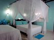 Temáticos Suíte na coloração suave, com uma cama de Casal e uma possível cama extra :: Pousada Jardim das Margaridas - Foto 5 Temáticos Suíte na coloração suave, com uma cama de Casal e uma possível cama extra :: Pousada Jardim das Margaridas - Foto 5