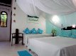 Temáticos Suíte na coloração suave, com uma cama de Casal e uma possível cama extra :: Pousada Jardim das Margaridas - Foto 6 Temáticos Suíte na coloração suave, com uma cama de Casal e uma possível cama extra :: Pousada Jardim das Margaridas - Foto 6