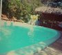 Com esse calor de meio dia essa piscina é tudo de bom ... :: Pousada Villa Caju - Foto 2 Com esse calor de meio dia essa piscina é tudo de bom ... :: Pousada Villa Caju - Foto 2