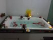 Apresenta a banheira de hidromassagem preparada com toques de amor e romance, cercada por velas, champanhe e o perfume de flores naturais. :: Hotel Pousada Vovó Duda - Foto 18 Apresenta a banheira de hidromassagem preparada com toques de amor e romance, cercada por velas, champanhe e o perfume de flores naturais. :: Hotel Pousada Vovó Duda - Foto 18