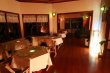 Restaurante com todas as mesas junto as janelas com vista para o vale e para as montanhas. :: Pousada O Montanhês - Foto 18 Restaurante com todas as mesas junto as janelas com vista para o vale e para as montanhas. :: Pousada O Montanhês - Foto 18