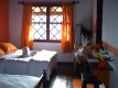 Quarto triplo com duas camas (solteiro e casal) :: Pousada Marjoan - Foto 10 Quarto triplo com duas camas (solteiro e casal) :: Pousada Marjoan - Foto 10