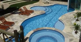 Maravilhosa piscina com hidromassagem e piscina infantil. :: Pousada Canto dos Pássaros - Foto 1 Maravilhosa piscina com hidromassagem e piscina infantil. :: Pousada Canto dos Pássaros - Foto 1