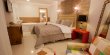 Contando com frigobar, ar condicionado split e uma banheira de hidromassagem, o quarto Master faz com que a sua ocasião se torne ainda mais impecável. :: Hotel Terras da Finlândia - Foto 18 Contando com frigobar, ar condicionado split e uma banheira de hidromassagem, o quarto Master faz com que a sua ocasião se torne ainda mais impecável. :: Hotel Terras da Finlândia - Foto 18