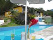 Piscina semi olímpica aberta com borda infinita :: Pousada La Dolce Vita Paraty - Foto 17 Piscina semi olímpica aberta com borda infinita :: Pousada La Dolce Vita Paraty - Foto 17