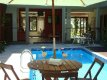 Área da piscina com umbrelones :: Pousada Don Juan - Foto 9 Área da piscina com umbrelones :: Pousada Don Juan - Foto 9