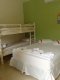 Suite casal com beliche quadruplo no térreo ,equipada , tv, ventilador de teto, frigobar, ar condicionado ,wi-fi. :: Pousada Recanto do Jabaquara - Foto 17 Suite casal com beliche quadruplo no térreo ,equipada , tv, ventilador de teto, frigobar, ar condicionado ,wi-fi. :: Pousada Recanto do Jabaquara - Foto 17