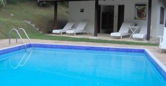 Piscina com a sauna ao fundo :: Pousada Canto do Bosque - Foto 2 Piscina com a sauna ao fundo :: Pousada Canto do Bosque - Foto 2
