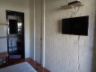 TV LED Suite casal :: Pousada Oceânica Zimbros - Foto 11 TV LED Suite casal :: Pousada Oceânica Zimbros - Foto 11