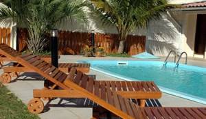 Área da piscina e sala de jogos :: Pousada Mar do Santinho - Foto 1 Área da piscina e sala de jogos :: Pousada Mar do Santinho - Foto 1