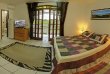 SUÍTE MASTER - suíte com ar, sacada com rede, cama de casal box, sofá, TV Smart, frigobar, ventilador de teto, guarda roupa e quarto de apoio com beliche. :: Pousada do Sol Garopaba - Foto 4 SUÍTE MASTER - suíte com ar, sacada com rede, cama de casal box, sofá, TV Smart, frigobar, ventilador de teto, guarda roupa e quarto de apoio com beliche. :: Pousada do Sol Garopaba - Foto 4