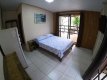 Suíte 11, tv led, geladeira, ventilador e roupas de cama, sacada espaçosa com rede. :: Pousada Pátio da Ferrugem - Foto 15 Suíte 11, tv led, geladeira, ventilador e roupas de cama, sacada espaçosa com rede. :: Pousada Pátio da Ferrugem - Foto 15
