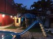Vista noturna da área de piscinas. :: Pousada Vila D Itália - Foto 9 Vista noturna da área de piscinas. :: Pousada Vila D Itália - Foto 9