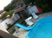 Vista do alto da piscina. :: Pousada Vila D Itália - Foto 12 Vista do alto da piscina. :: Pousada Vila D Itália - Foto 12