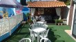 Área com mesas ao sol Pousada Vó Maricota :: Pousada Vó Maricota - Foto 22 Área com mesas ao sol Pousada Vó Maricota :: Pousada Vó Maricota - Foto 22