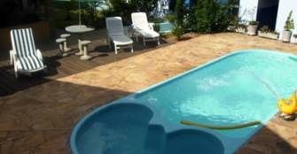 Piscina e hidro em temperatura ambiente :: Pousada Rota das Cachoeiras - Foto 1 Piscina e hidro em temperatura ambiente :: Pousada Rota das Cachoeiras - Foto 1