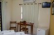 Área de trabalho com escrivaninha e cadeira, a pousada conta com internet wi fi para todo os quartos :: Pousada São Geraldo - Foto 16 Área de trabalho com escrivaninha e cadeira, a pousada conta com internet wi fi para todo os quartos :: Pousada São Geraldo - Foto 16