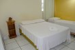 Suite Familiar (Quadruplo) com uma cama de casal e duas de solteiro, tv e frigobar e ar condicionado. :: Pousada São Geraldo - Foto 6 Suite Familiar (Quadruplo) com uma cama de casal e duas de solteiro, tv e frigobar e ar condicionado. :: Pousada São Geraldo - Foto 6