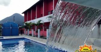 Piscina com Cascata :: Pousada Caraguá - Foto 1 Piscina com Cascata :: Pousada Caraguá - Foto 1
