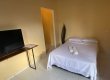 Suite Familia para 10 Pessoas ,com Tv Smart,Ar condicionado e frigobar  :: Pousada 4 Elementos Guarujá - Foto 19