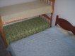 Quartos - Uma cama de casal e uma beliche em todos os chalés :: Chalés Ilha das Flores - Foto 11 Quartos - Uma cama de casal e uma beliche em todos os chalés :: Chalés Ilha das Flores - Foto 11