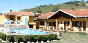 esta foto é da area de lazer da piscina com a churrasqueira :: Pousada Flôr de Ipê - Foto 1 esta foto é da area de lazer da piscina com a churrasqueira :: Pousada Flôr de Ipê - Foto 1