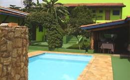 Piscina (Aquecimento solar) com cachoeira :: Pousada dos Caminhos - Foto 1 Piscina (Aquecimento solar) com cachoeira :: Pousada dos Caminhos - Foto 1