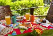 Café da manhã com vista para o jardim dos fundos :: Pousada Encanto das Pedras - Foto 6 Café da manhã com vista para o jardim dos fundos :: Pousada Encanto das Pedras - Foto 6